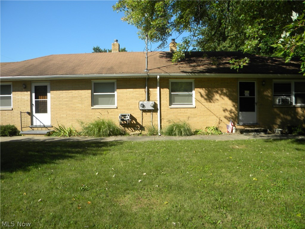 Well maintained with a great rental history in the heart of Lakemore. This all brick duplex has a full basement that is partially finished for both units. Newer windows and roof, plus each unit has a carport. Tenants pay for gas and electric, great opportunity for a investment property or owner occupant in one unit and rent the other. Don't miss out.