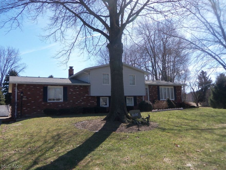 Almost an Acre - Double lot =200x200, .9182 Acres.  4-Level Split allowing spacious usage.  Specially designed 30' kitchen/dining with great window views overlooking intriguing backyard landscaping including custom water feature and exiting to 21x16 deck. Not your typical boxed homes all in a row but more like mature trees and different styles, making a more interesting neighborhood, in such a fine location just North off Mount Pleasant, Lake twp, North Canton schools. The $64 gas budget should make you very happy!  Three fireplaces (two are gas ventless & 1 is woodburning).  Double garage but extra parking area in 20x40 turn-around too. Also, fenced boat storage area.  Lots of appliances are included. Yes, New tear-off shingles, roof included all new shingles and wood as needed in 2013.  Taxes are currently discounted $244 for homestead exemption.  Originally built by this current owner with lots of thought, planning and design.  Now down-sizing and have already purchased their next h