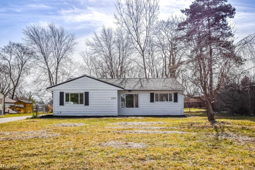 Delightful updated ranch home offering true one floor living with all the right improvements! Such a great flow between the rooms with vinyl plank flooring in all of the living areas including the light filled living room and adjacent dining room. The kitchen is amazing featuring stainless steel appliances, a farmhouse sink, hexagon tile backsplash plus lots of cabinet and counter space! All 3 bedrooms have brand new carpet and use of the remodeled full bath complete with a shiplap accent wall and tub/shower with a beautiful tile surround. A dual purpose laundry/mud room provides convenient access to the covered patio, fully fenced backyard, and 2 car detached garage. Recent updates include a new roof, light fixtures, paint, flooring and more. Don't miss this gem on a half acre lot just minutes from I-71, parks and all amenities. Call to schedule your showing today!