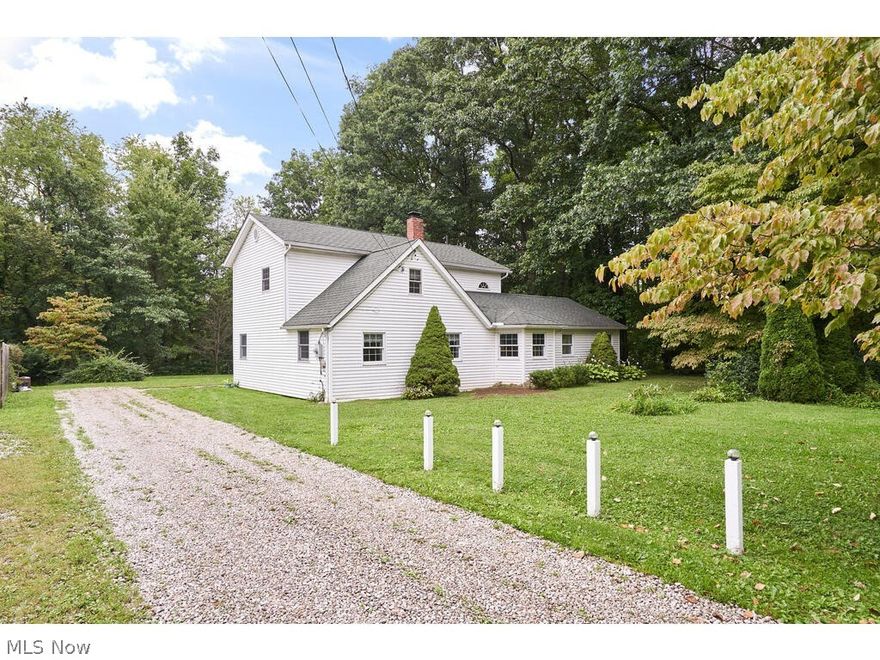 Updated and reimagined home on 1+ acres at the end of a dead-end street in Coventry Township. This 3 bedroom, approx. 2000 sq ft home offers country living with city amenities.  Highlights include hardwood floors on the main floor and windows to allow natural light throughout. The family room features a wood-burning oven, storage cubbies and plant sills.  The large kitchen provides plenty of cabinet space and views of the beautiful yard. The dining room opens to the kitchen with a lovely French door that gives you easy access to the backyard. The first-floor bedroom includes two closets.  The oversized bathroom offers plenty of storage, a shower and a nice-sized tub: a convenient first-floor laundry room and a nice-sized mudroom. Two bedrooms, a loft and an office, make up the second floor.  Each room on the second floor has LVT flooring and new windows.   The vaulted master suite adjoins the office and offers a large walk-in closet. The beautiful backyard is very private, with woods a