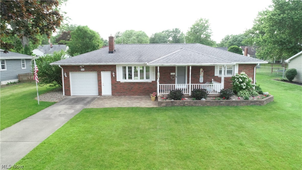 Quality brick ranch with updated Kitchen, granite bath, formal living room, and vaulted sunroom. Interior designer's dream. Raised beds in a manicured yard. Beautifully updated, all newer flooring, home has been freshly painted with an attached garage with a full basement which was previously waterproofed. Home shows extremely well.