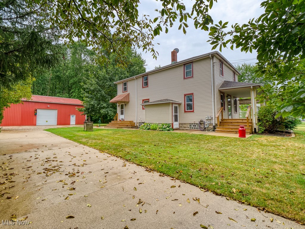 Welcome to 110 Railroad Street—a one-of-a-kind property that has been meticulously maintained by the same owners for 45 years. Set on a quiet and private lot in the heart of Lagrange, this home offers the perfect blend of residential comfort and commercial opportunity, making it unlike anything else on the market. The home itself is exceptionally clean and well cared for. Inside, you’ll find a spacious family room with a dining area, a separate formal living room, and a beautifully updated kitchen featuring custom cabinetry, quartz countertops, and stainless steel appliances. Just off the kitchen is a versatile workspace with built-in shelving and a large storage closet, ideal for a home office or hobby area. Upstairs, the home offers five total rooms, including three bedrooms with closets. The primary bedroom features a large walk-in closet with custom built-ins, while two additional bedrooms each include attached bonus rooms—perfect for study space, gaming, or play areas. The full bathroom was fully renovated in 2021 with a smart two-room design and generous linen storage. Additional updates include new windows, a 50-year roof and a new gas water heater. The clean, dry basement provides extra storage space and includes a washer and dryer. Outdoor amenities include a large covered front porch, a covered back patio, and a full concrete driveway. What truly sets this property apart is the additional outbuilding, offering endless flexibility. The rear building offers a large workshop with an upstairs loft, making it perfect for a car collector, mechanic, craftsman, or additional storage. With its combination of a beautifully maintained home and incredible outbuilding space, this property is ideal for families, entrepreneurs, or investors alike. A rare Opportunity!!
