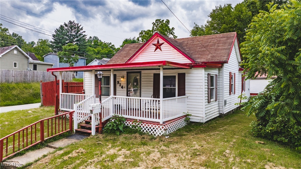 Opportunity knocks! This classic Ranch Style home AND Tiny House offer the perfect chance to create your dream INCOME PRODUCING property and add your personal touch!! 2 bedrooms, huge 23x8 entry way, eat in kitchen, living room, separate utility room & additional mud/laundry room. The 14x5 Office can also be used as a 3rd bedroom. Fully fenced yard – perfect for pets, gardening, or entertaining. BONUS FEATURE: Detached Tiny Home! Included on the property is a cozy, detached 1 bedroom tiny house currently rented at $500/month, offering immediate rental income. Use it as a guest suite, home office, or keep it as a steady income source. Don't miss out on this adorable income producing property - call for you private showing today!