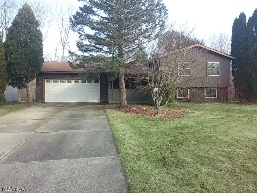 Large 5 bedroom split-level w/ open floor plan.  Features an addition with vaulted ceilings off the back of the house consisting of a family room, bedroom, and an office.  2 full bathrooms.  2 car attached garage.  Large deck and private back yard.  Lots of house for the money.  Come see for yourself!