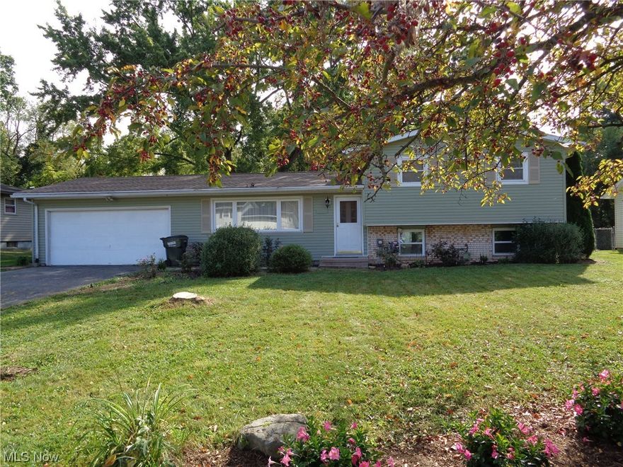 )Outstanding Value! Split Level in Perry Township. Features Living Room + Family Room/Wood Burner, 3 Bedrooms, Full Bath, Applianced Kitchen, Newer Appliances 2022, Dinette, Hardwood Floors. Updates Include A/C, HWT, Siding, Garage Door Opener All in 2023. High Efficiency Gas Furnace, New Carpet  All in 2022, Roof Shingles 2021. Shed 10x16, Deck 12x14, and Patio 10x23.