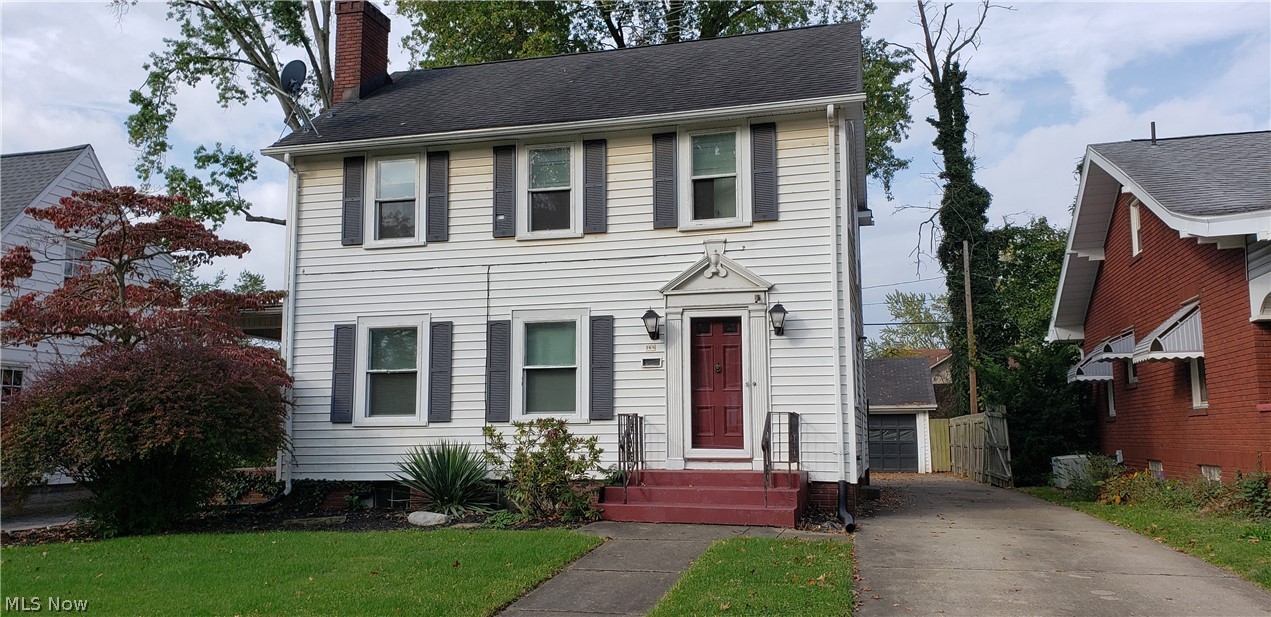 Home has hardwood floors & natural wood trim throughout most of the home, downstairs & upstairs. You will be in awe at the woodwork on the stairs & landing when you walk inside the front door. A rare & beautiful find in a home. Home has lots of character. Check out the fireplace in the living room, built-in pantry, large over-sized window in the dining room, unfinished attic for storage, the bonus room off the kitchen for your office or extra eating area. Door in living room opens to the large, relaxing covered porch that graces the side of the home. Porch has gate to the brick patio in the fenced-in back yard - perfect for grilling, eating & just chilling. Perfect for summer enjoyment. Home is located in the very desirable Lincoln School District. Seller providing a Home Warranty for additional piece of mind.