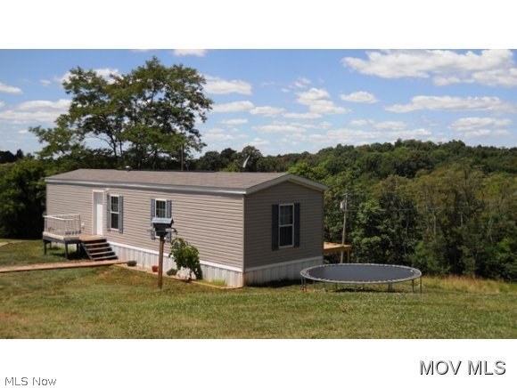 2010 Buckeye Home 14 x 52 that has been meticulously maintained. Home is not real property. Site offers fantastic view. Single wide could be moved for a building site. # 509 Elem: Belpre Elementary School Elem/Bus: Y JrHigh: Belpre Middle School JrHigh/Bus: Y High: Belpre High School High/Bus: Y Fire: VOL Police: SHF PossFreeGas: N ;SQFT=Fin L1:728, Fin Bsmt:0, Fin Above:728, Fin Total:728, Unfin Above:0;PRKG= Off Street