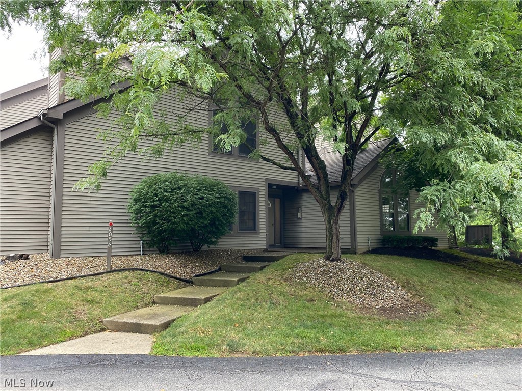 Welcome home to a 1st floor ranch condo in Canfield’s Summit at St Andrew’s. This unit features new paint throughout. The great room has vaulted ceilings and new wood flooring, sliding glass doors lead to the private side patio. There’s a corner gas fireplace from the great room to the dining room. Cute kitchen with breakfast bar. Appliances stay. Attached laundry room with extra storage shelves. Ceramic tile runs through the kitchen, laundry, dining and hallway. 2 bedrooms including the main bedroom with a master bath & walk in closet. Home warranty provided! Call today!