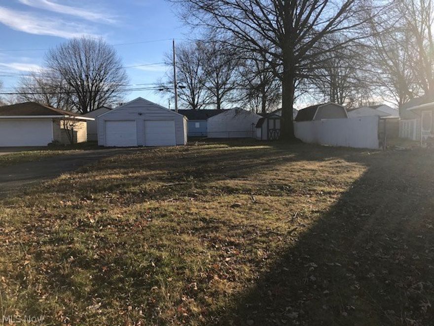 Vacant lot in Mayflower Village. Two car garage and storage shed. Perfect set up for Residential Car Hobbyist or extra storage without paying rent.