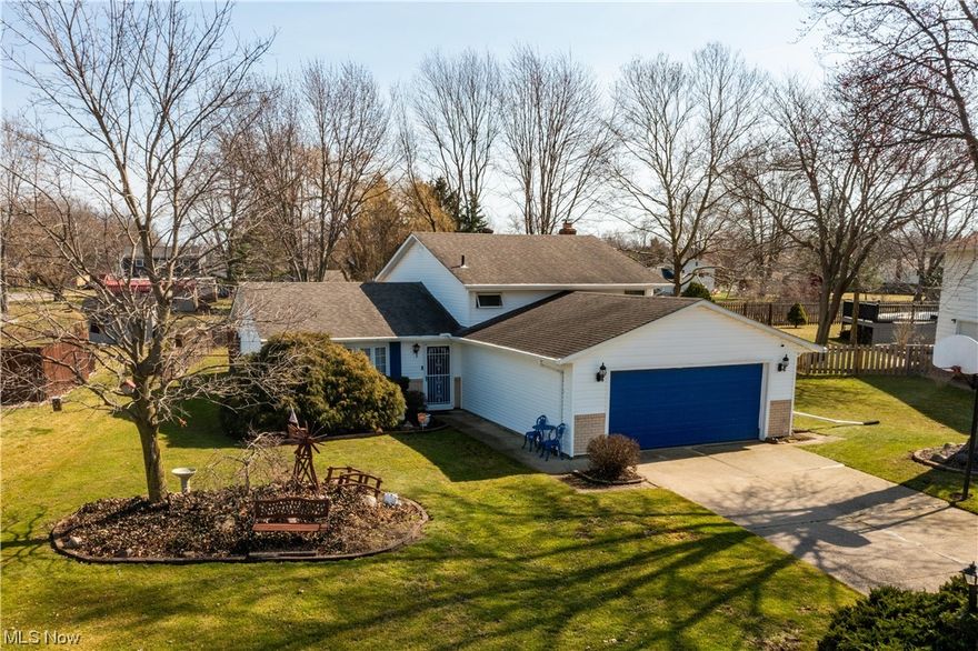 Welcome home to this charming North Ridgeville split-level, offered by the original owner. The main level welcomes you with a spacious living room, cozy dining room, and kitchen with an island and large pantry. Upstairs, you will discover three ample bedrooms and a full bathroom. The master bedroom provides its own entrance to the second floor full bath. The lower level offers a spacious family room with gas fireplace, second floor full bath, and larger laundry area with an additional freezer.  Utilize this second living area for cozy movie nights or relaxing by the fireplace. Walk outside the dining room to your beautiful wood deck partially covered with a pergola. The larger fenced backyard provides ample space for gardening and outdoor entertaining. Also located outside is a shed for any needed storage or lawn equipment. This adorable split-level home offers a combination of living space and outdoor amenities and is in close proximity to local shopping and highways.  Don't miss out on the opportunity to make it your own. Call for a private showing today!