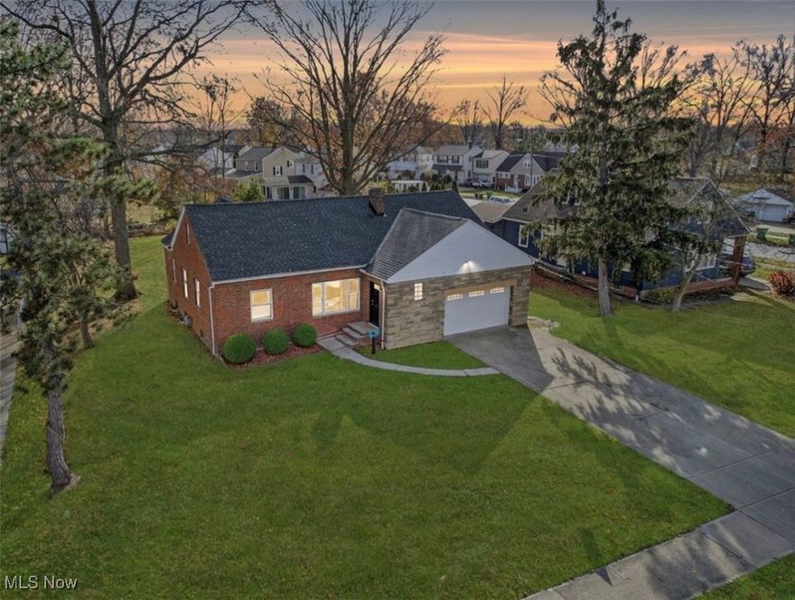 Prepare to be impressed by this top-to-bottom renovation on a rare double lot in Willowick. This all-brick ranch has been fully redesigned with high-end finishes, major mechanical upgrades, and a brand-new 650 sq. ft. second-floor addition that greatly expands the home’s versatility and living space.

Step into the showpiece of the home—an absolutely stunning custom kitchen featuring Quartz countertops, a large center island, premium shaker cabinetry, all new stainless steel appliances, a built-in microwave drawer, and a direct-vent range hood. The expanded layout seamlessly connects to the dining area and living room, all enhanced by new wide-plank flooring and recessed LED lighting.

The newly added second level offers endless flexibility—perfect as a 4th bedroom, media/theater room, home office, guest suite, or creative loft space. Bright, open, and spacious, it adapts to any lifestyle.

The main level also includes a brand-new first-floor laundry, a beautiful, fully updated custom full bath with double vanity and designer tiled shower.

Downstairs, a huge walk-out basement provides exceptional additional space, complete with an extra half bath—ideal for finishing, storage, a workshop, or rec room.

Outside, enjoy a newly added covered back patio, perfect for entertaining or relaxing year-round. The property also includes a heated 2-car attached garage, a rare and valuable feature.

Major updates include: New furnace, New AC, New roof, New windows, New sewer line, New electrical and recessed LED lighting throughout
This home blends the charm of an established neighborhood with the feel of brand-new construction. Minutes from Lake Erie, parks, schools, shops, and freeway access.
Fully updated. Thoughtfully expanded. Move-in ready. A rare find on one of the largest lots in the area. If you’ve been searching for a truly turnkey home with modern upgrades, flexible living space, and a huge walk-out basement—this is the one everyone is asking about.