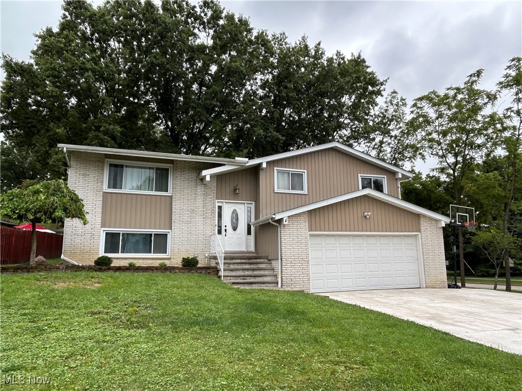Welcome to 6650 Parkgate Oval in the heart of Seven Hills! This well-maintained 4 bedroom, 2 bath home offers comfort, space, and modern updates in a highly desirable neighborhood. With 1,680 sq ft of living space and a walk-out lower level, this home is perfect for both everyday living and entertaining.
Step inside to find an inviting layout with plenty of natural light. The spacious living and dining areas flow easily into the kitchen, making gatherings a breeze. The kitchen features Stainless Steel appliances and ample cabinet storage. Upstairs, you’ll find three generously sized bedrooms and a full bathroom.
The finished lower level adds flexible living space—ideal for a family room, home office, or workout area. There is another bedroom in the lower level as well as a full bathroom. Additional highlights include newer A/C & furnace (2021) and new roof installed this year.
Outside, enjoy the privacy of a 0.41-acre lot with a tree-lined backdrop and plenty of room for outdoor entertaining. An attached garage and newly paved driveway (2024) add everyday convenience.
Located in the Parma School District, this home is close to parks, shopping, and highways while tucked away on a quiet street.
Don’t miss the opportunity to make this spacious, move-in ready home yours—schedule a showing today!