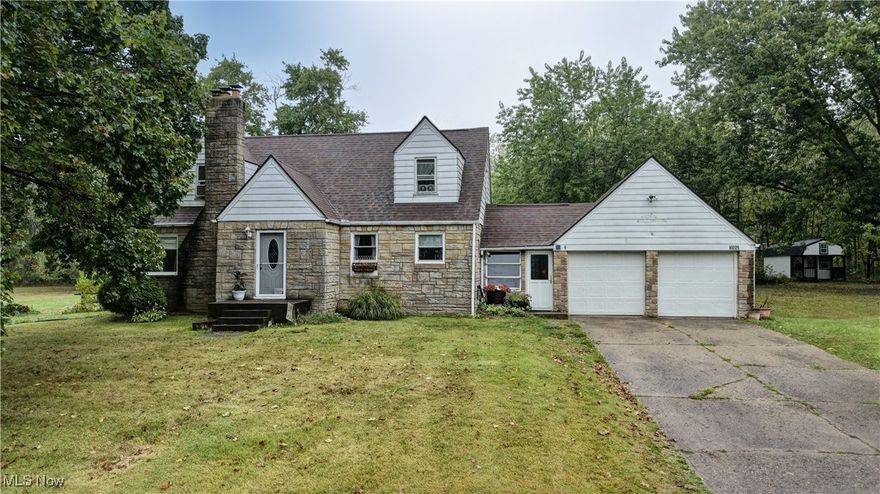 Welcome to this beautiful cottage located in the Tuslaw School District! This home offers that out of town feel but conveniently located minutes to town with so much character to appreciate. The home sits on 1.73 +/- acres. A beautiful kitchen that flows into the living room and dining room with wood floors and a fireplace perfect for this winter. Offering 2 bedrooms, 1 located on the main level and one upstairs that's expanded by a cozy loft.  Full basement with a second fireplace to help make your heating bills more efficient. An extra add on room previously used as an office and crafting room opens to a newer deck where you step outside to a large backyard perfect for entertaining and gardening! The spacious backyard, which includes a barn, lots of plants and fruit trees, and a chicken coop. Don't miss out schedule your showing today.