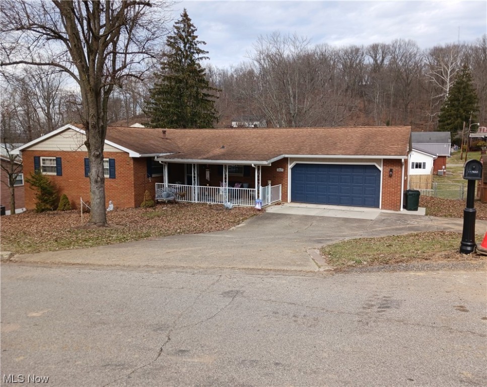 Brick and Vinyl ranch, large living room, dining room with French doors leading out to a really nice sunroom and deck. The kitchen has been remodeled and includes newer appliances. A master bedroom with bath. Large lower-level family room and bedroom with newer carpet. Family room also has a gas log fireplace and glass sliding doors leading out to the patio and a large fenced in back yard. Some other updates include remodeled baths, laminate flooring, trim, doors, gutters, shutters. Fresh paint, New GFA heat in December 2023 New front porch railing. It has numerous closets for storage plus a large unfinished area in the basement that could be finished for more added living square footage. "Listing broker is owners' sister."