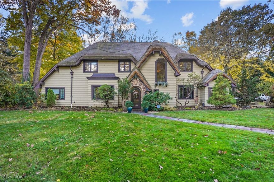 Nestled along the picturesque Silver Lake Blvd, this inviting Cottage Style home found at 2934 Silver Lake Blvd offers a blend of comfort, style, and tranquility. The home welcomes you with its classic curb appeal—mature trees shade a well-kept yard, while a stone walkway leads up to the front entrance, setting the tone for the warmth found inside. Step inside and immediately notice the warm hardwood floors that flow throughout the main living spaces. The spacious living room is bathed in sunlight streaming through oversized windows. A cozy fireplace serves as the focal point, enhancing the home’s welcoming character during cool Ohio evenings. The kitchen is thoughtfully designed featuring sleek granite countertops, stainless steel appliances, a generous pantry, and an abundance of cabinetry. The adjoining formal dining room is brightened by large  windows with views of Silver Lake. Retreat to the 2nd floor primary suite, where you will find ample space for a king-sized bed, a walk-in closet, and an en-suite bathroom. A second bedroom also offers its own private ensuite bathroom. Additional bedrooms are equally comfortable, each boasting generous closet space and large windows that frame peaceful outdoor views. The updated guest bathroom completes the second floor living quarters. A spacious recreation room provides the perfect setting for game nights or movie marathons. This home also boasts a recently installed sauna in the basement, providing a relaxing retreat. The property also features a 3-car garage and charming yard with stone and brick patios ideal for entertainment. Enjoy your summer evenings walking around serene Silver Lake. All this plus recent update of windows, cedar roof, boiler, central air, sump pump, basement waterproofing, and nature stone flooring in the Garage. Do not miss the chance to be a part of the welcoming Silver Lake Community, 2934 Silver Lake Blvd offers an exceptional lifestyle for its next owner. Call for your private showing today.