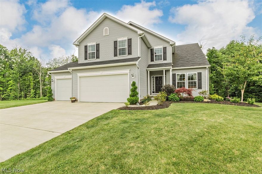 Wow!  Custom Built K. Hovnanian Home ~ just 4 years old!  This home features a dramatic two-story great room with vaulted ceilings, open kitchen with granite counter tops, 42" cabinets and stainless-steel appliances along with a generous size, casual eating area.  Desirable, spacious, first floor owners’ suite with glamour bath and huge walk-in closet.  The first floor also includes 9’ ceilings throughout, a dining room or office off the foyer, guest bath and a large laundry room.  Off the kitchen is an absolutely amazing deck (18’ x 20’) with views of the sprawling backyard and nature preserve.  The second floor boasts a versatile loft space equipped with surround sound that is well suited for entertaining or quiet movie nights, two large bedrooms and a full bath.  The walk out basement with additional windows adds a whole other level to play, workout or enjoy with friends and family.  Don’t forget the 3 car garage with 4’ extension.  All of this and it is on a quiet cul-de-sac in sou