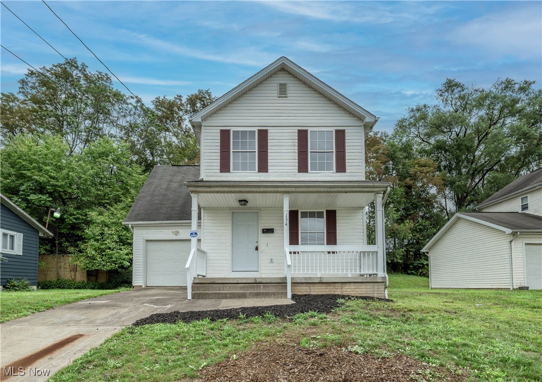 Looking for a house that feels like home from the very first step?? This is the home you have been waiting for. Come see this beautifully updated 4 bedroom, 1.5 bath home today. Step up onto the welcoming covered front porch and enter a spacious living room with new LVT flooring throughout the first floor. The large living room seamlessly flows into a dining area connected to updated kitchen with new cabinetry, counters tops, and ceramic backsplash. Did I mention the stainless appliances? The home comes equipped with a stove, refrigerator, dishwasher, and a microwave. A convenient pantry and updated half bath complete the main level. Upstairs, you'll find four bedrooms, each freshly painted with new carpeting. The full bath offers a tub/shower combo. Plenty of potential awaits in the unfinished basement. It could be future living space, recreation space, or just storage space. The whole house fan will help you stay cool in the summer. Enjoy the convenience of a one-car attached garage. This home is perfect for those wanting an updated move-in ready home. Call to see it today!