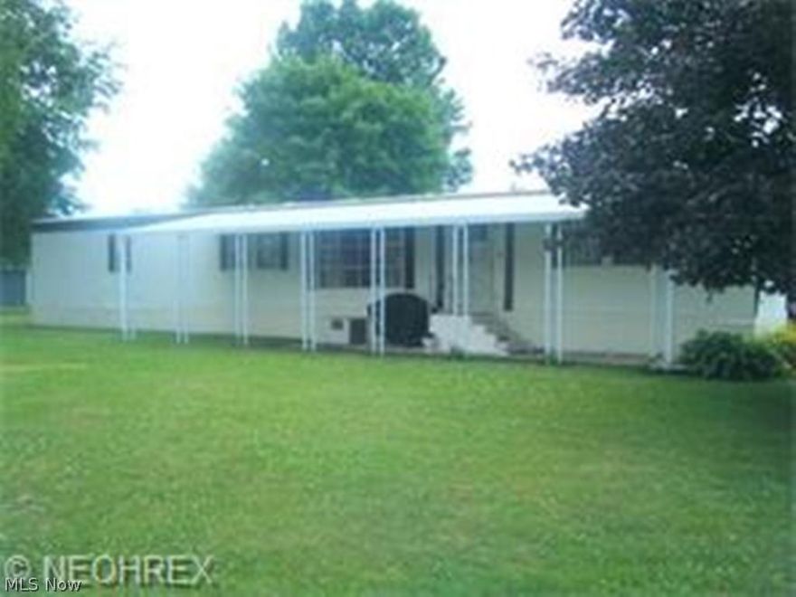 New hot water tank and roof coating in 2013 and new central air in 2015.  Home has many updates including windows, counter top, car port, and large patio.  May stay in park with managers approval.