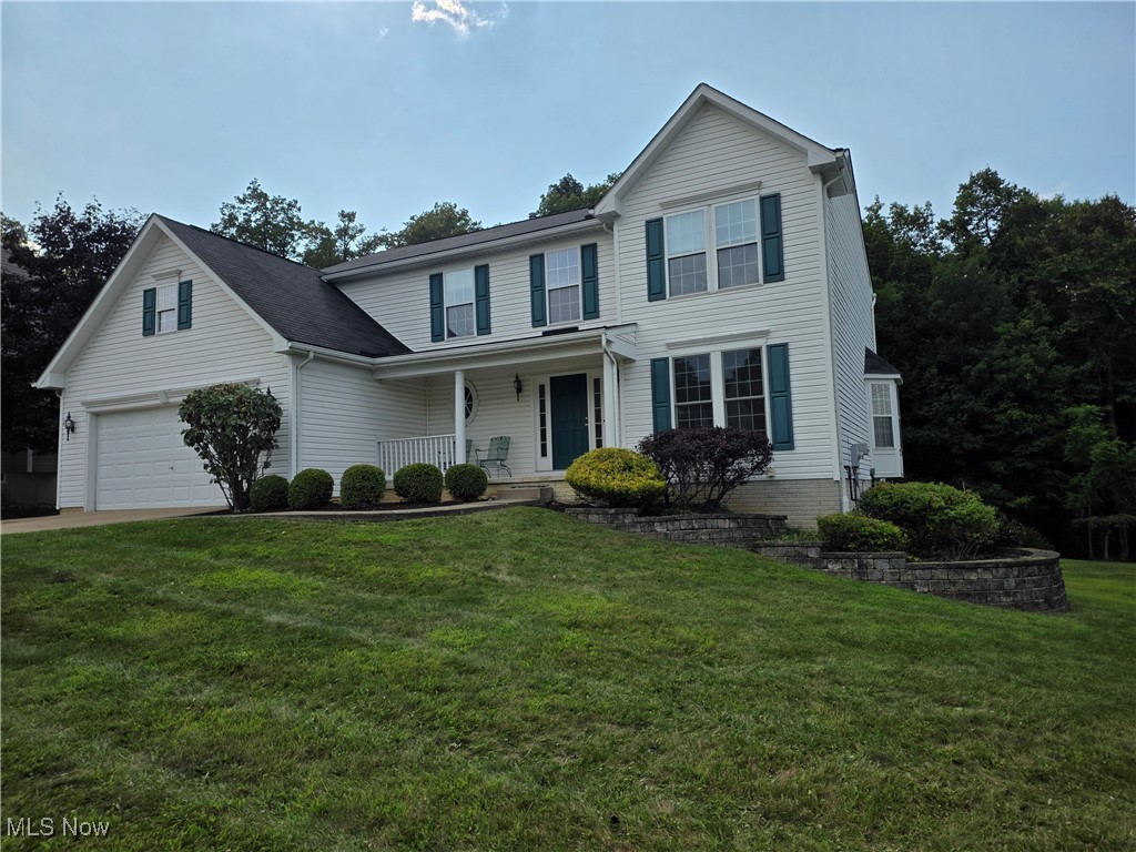Welcome to your dream home in the highly sought-after Lexington Ridge community of Medina, which has a private neighborhood pool, playground, & clubhouse! This stunning 4-bedroom, 2.5 bath Colonial offers an exquisite blend of elegance and comfort. Step inside the grand two-story foyer with its beautiful wrapping staircase. To your right, a versatile family room/office with French doors seamlessly connects to the formal dining room, boasting double bay windows and abundant natural light. To your left, a convenient half bath that leads to the family room. The heart of the home is the chef's eat-in kitchen, featuring a large island, stainless steel appliances, a gas stove, and a convenient pantry. Perfect for entertaining, the enormous family room with hardwood floors and a cozy gas fireplace flows effortlessly to a private wood deck overlooking the serene, fenced wooded backyard. Upstairs, the expansive master suite provides a luxurious retreat, complete with a sprawling walk-in closet and a private full bath with dual vanities. Three additional spacious bedrooms share a well-appointed full bath. The lower level offers incredible potential with a huge walk-out basement, ready for your personal touch and leading to a charming brick patio. A convenient first floor mudroom/laundry room with a wash tub connects to the attached two-car garage. For peace of mind, a one-year home warranty is included. Don't miss the opportunity to make this exceptional property your own!