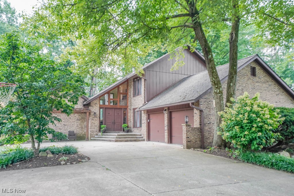 If you're looking for a well maintained home that stands out from the rest, 2664 Pine Lake Trail is one you’ll want to see! Striking contemporary architecture starts with double entry doors topped with clerestory windows that fill the vaulted foyer with light. The family room features a beamed ceiling and brick fireplace, with bamboo floors continuing into the dining room and its large picture window. The kitchen is a highlight with new LVP flooring, plenty of cabinet storage, stainless steel appliances, plus a breakfast bar for casual meals. Nearby, the living room has a new patio door that opens to a tiered, pergola covered deck. A guest bath and laundry room complete the main level.
The finished lower level adds extra living space with a rec room and a great setup for a home office. Upstairs, the primary bedroom offers two double closets and a private full bath with a skylight. Two more bedrooms share an updated full bath with a double vanity and yet another skylight Perfectly set on nearly 1/2 an acre, the fenced backyard includes a fire pit and shed, while the attached two car garage provides parking and storage. All of this in the desirable Green LSD. Schedule your showing today and see all this home has to offer!