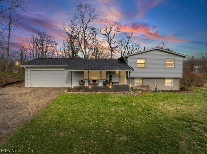 Welcome to this three-level split offering a blend of comfort, functionality, and stylish updates. Situated on a spacious corner lot, this property features a large backyard, perennial landscaping, and a covered front porch that enhances its curb appeal. Inside, you’ll find bamboo flooring flowing through the living room, dining area, family room, and hallway. The bright living room, filled with natural light from the front windows, opens seamlessly to the dining area, where sliding doors lead to a stamped concrete patio—ideal for outdoor enjoyment. The kitchen offers ceramic tile flooring, a breakfast bar, and pantry providing both convenience and efficiency. Just a few steps down, the inviting family room includes recessed lighting, a built-in entertainment center, and updated railings. A bonus room adjacent to the laundry area provides flexible space for a home office, hobby area, or additional storage. Upstairs, you’ll find three bedrooms with carpeting and a full bathroom featuring ceramic tile flooring. Additional highlights include a double-wide driveway with extra parking space suitable for multiple vehicles, as well as a storage shed. Major mechanical and exterior updates add peace of mind, including a new roof and siding in 2023, along with a well pump, well wiring, pressure tank, and switch all replaced in 2021. Conveniently located near parks, walking trails, shopping, and everyday amenities, this home offers a great combination of indoor comfort and outdoor space.