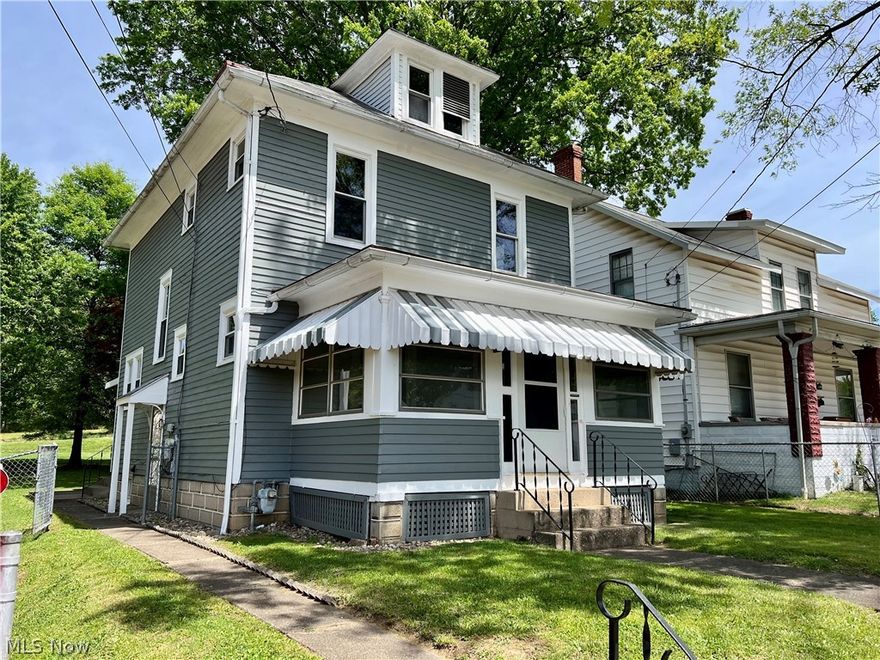 Welcome to 1303 25th Street in Parkersburg, WV, a charming 3-bedroom, 1.5-bath home that beautifully combines original charm with modern touches. As you step inside, you'll be greeted by stunning original hardwood floors that flow through the living and dining areas, illuminated by plenty of natural light. The first floor is completed with a kitchen, a convenient half bath, and two cozy enclosed sun porches at the front and back of the house. Upstairs, you'll find all three bedrooms, each with those original hardwood floors, along with a full bathroom. Additional highlights include a clean unfinished basement with painted floors, a large level partially fenced backyard, and a papered alleyway out back giving you the option for parking/garage. Conveniently located within walking distance to Parkersburg High School and nearby shops and restaurants, this home is must-see. Schedule your tour today!