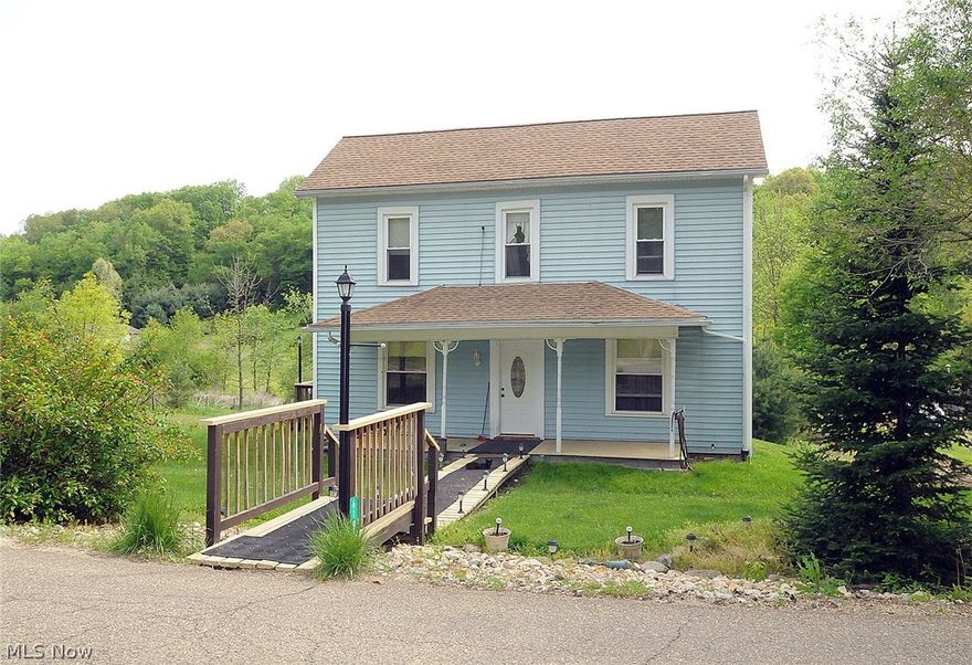 Charming older 2 story with 7.58 acres! Large country kitchen w/ FP w/gas logs, portable bar w/stools. French doors lead to enclosed porch. 1st floor laundry & bedroom. 2 bedrooms up. Nice rear deck and covered front porch. Cozy LR w/ FP w/ gas logs. Geothermal heat, CA & roof all newer. Updated bath. Much potential still here with this home. Acreage across from the home. Home is on appox 1 acre, remainder across from the road. Storage barn new in Dec. 2014.