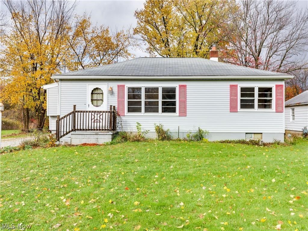 NEW CARPET INSTALLED! GARAGE REPAIR AND PAINTING COMING IN SPRING! FRESH PAINT AND WINDOW GLAZING! Green schools! Home warranty included! Large double lot totals almost an acre. Plenty of natural light in the home. Mud room leads into eat-in kitchen with fridge and stove included. Good sized living room with gas fireplace. 2 bedrooms and 1 bath plus lots of closets and attic access. Spacious basement is partially finished and has office, recreation, utility, laundry, storage, and workshop areas. Water softener and whole house filter just serviced. 2 sump pumps. Comes with washer and dryer. 2 car detached garage has electric and heat. Roof and siding redone in 2002. Septic just pumped. Country feel. Close to highways and shopping while in a quiet setting. Schedule your viewing today for this great home! Also for sale and tenants will need to accommodate showings with 24 hour notice. Month to month, one year, or two year, depends on situation. Pets negotiable with additional pet rent and