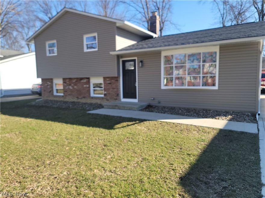Completely remodeled from top to bottom, this home offers the look and feel of new construction without the new-build price. Recent updates include a new roof, windows, gutters, downspouts, vinyl siding, driveway, and a waterproofed lower level.

The interior has been fully renovated with a thoughtfully designed U-shaped kitchen featuring granite countertops, updated bathrooms, new flooring throughout, modern outlets and switches, new doors, baseboards, and trim. Approximately 50 recessed LED lights provide bright, consistent lighting across the home.

Additional improvements include new insulation in both the attic and walls for enhanced efficiency. Hardwood floors in the living room, stairways, and bedrooms have been beautifully refinished in a natural wood tone. The main bathroom features new ceramic tile, a new tub, vanity with a solid surface top, updated drywall, vents, and fixtures.

This is a truly move-in-ready home—an exceptional opportunity you won’t want to miss.