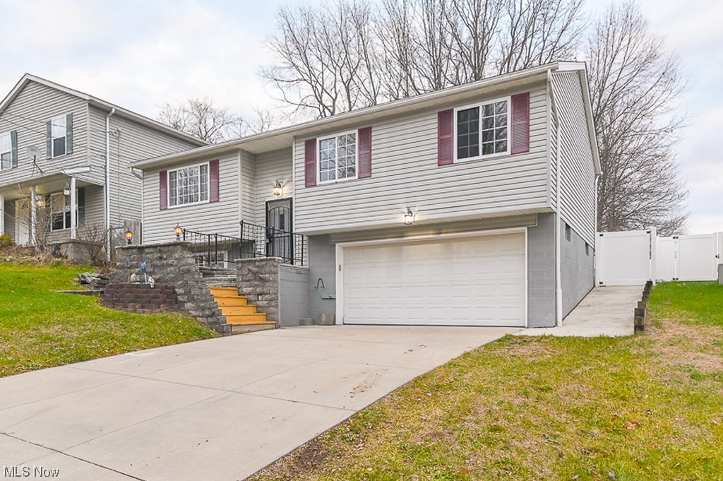 Newly renovated listing in Barberton! This property has three bedrooms, two baths (one full, one half), a first floor laundry room and a two and half car attached garage. Updates for 2023 include a new roof, finished basement, new flooring (carpet and luxury vinyl flooring), newly remodeled front porch, rear deck and a newly fenced backyard. Please contact a real estate professional to schedule your private showing today!