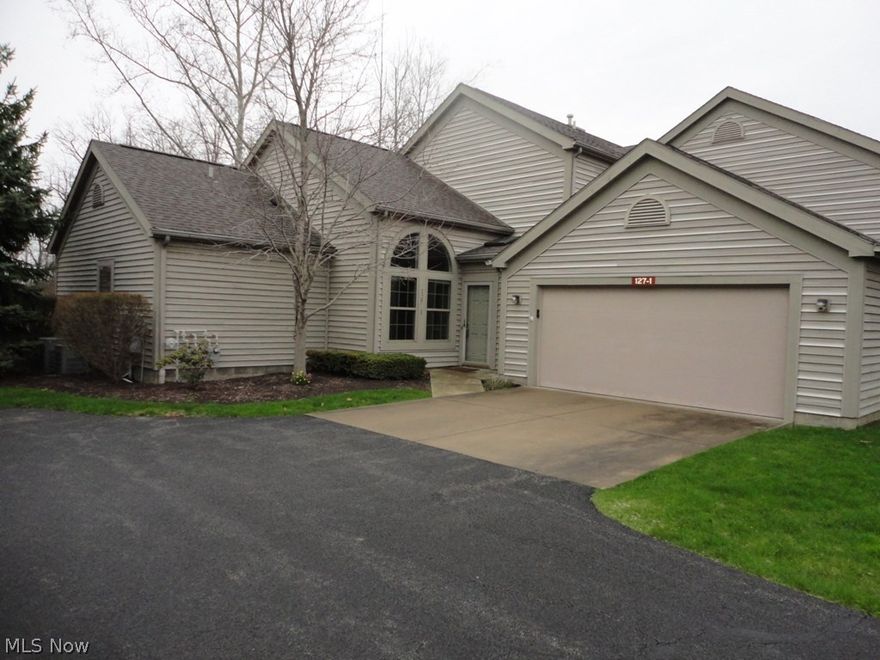 Great Backyard & View of Stream!  Vaulted Ceilings, Formal Dining Area,  Both Bedrooms have Large Walk-in Closets,  Nice Sun-room with Great View. Smart TV & electric Fireplace add to your comfort. Master Suite with skylight.  Must See!  Private setting (duplex unit)