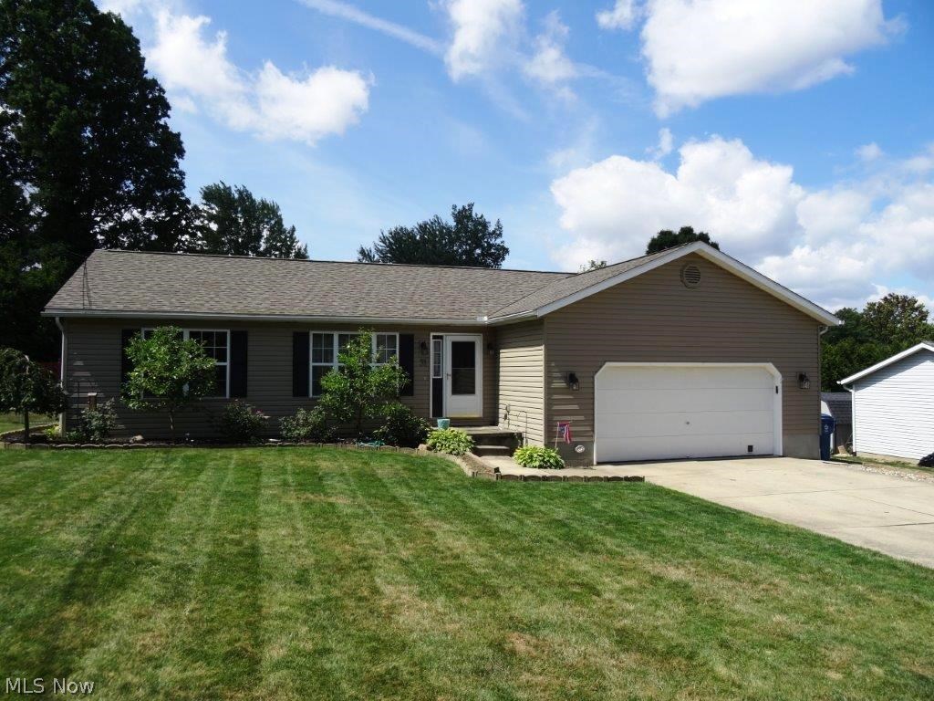 Rare Tallmadge ranch! Move right in to this sparkling ad updated 3 bedroom/3 full bath one story home. The inviting floor plan features an open concept kitchen and dining area, sliding door to the deck and yard, and formal living room. Matching stainless appliances are all included! Master suite w/full bath, two ample sized bedrooms, another full bath w/marble flooring and convenient first floor laundry complete the main floor. Head downstairs and you'll fall in love - huge rec room w/stone front gas fireplace, and a custom built bar w/seating for 6! Another large family room and office + another full bath along with extra storage space complete the lower level. Outside you will find a sprawling front yard, flat paved driveway, 2 car attached garage, and around back a private deck and flat yard space perfect for entertaining. Major updates include: roof/siding 2012, electrical panel and service 2016, hot water tank 2010, stainless dishwasher 2016, patio door 2010, whole house fa