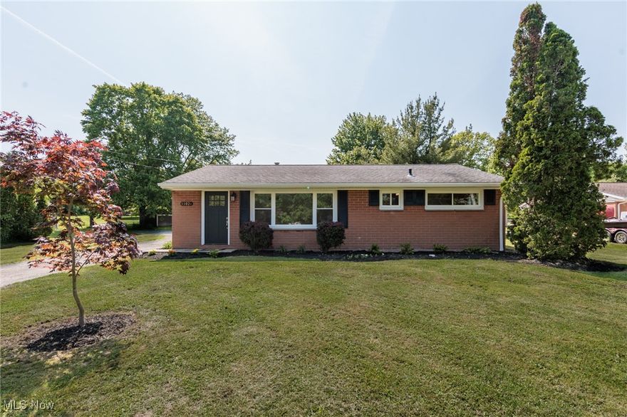 Welcome to this immaculate 3BR ranch in a great location! Move right into this bright, inviting home! The tastefully remodeled property features a stunning new kitchen with white soft-close cabinets, granite counters, plus a new stainless steel dishwasher and over-the-range microwave. The bathroom showcases a beautifully tiled walk-in shower. Other outstanding features include new vinyl windows and luxury vinyl tile flooring throughout, high efficiency LED interior lighting, updated plumbing and electric, new exterior doors. A new furnace, hot water tank and A/C complete the many updates. The 30x24 garage has a workshop and a new roof. The entire interior has been painted in modern and inviting colors. All on a spacious one acre lot!