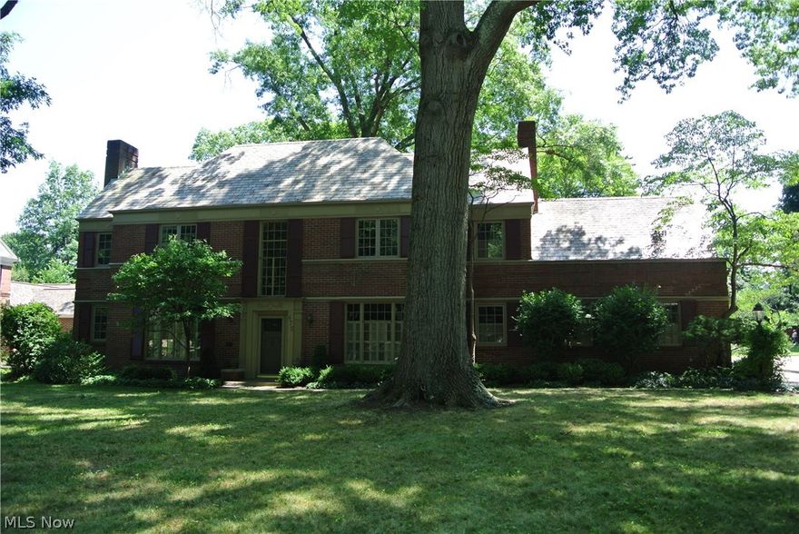 A rare opportunity to live in a Roy Firestone (architect) designed home. Spacious center hall Col features include a spacious formal living room with fireplace. The living room features a large bay window, crown moldings and French doors to an enclosed rear porch. The formal dining room has built-in corner cabinets, large central window and beautiful chandelier. All 1st floor rooms have oak floors. Off the dining room and kitchen is a breakfast room with hand painted mural and access to the 2-car attached garage. The kitchen is in the rear and offers lots of wood (cherry counters, wood ceiling and accent wall), a large built-in pantry in the hall, Jennaire drop-in range & dishwasher, Thermadore wall ovens (2)and Amana refrigerator. Off the foyer is a wood paneled library/den that has access to the enclosed rear porch. Upstairs you’ll find the master bedroom/bath with ample closets and a walk-in dressing area with built-ins. The remodeled master bath features a glass shower stall and tr