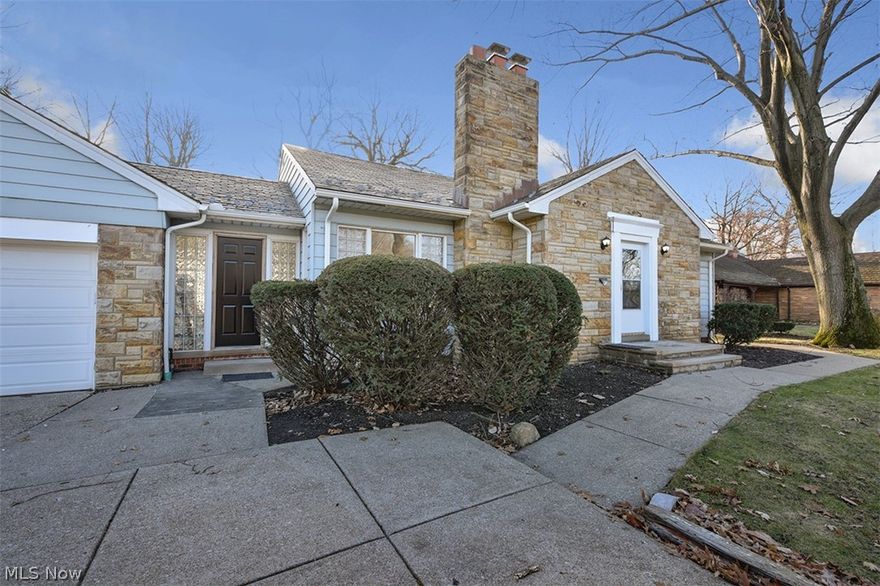 Beautifully rehabbed home! Come see this spacious home with wonderful flow and light! Kitchen overlooks large backyard and features all stainless appliances and new, subway tile back splash. Beautiful lot, attached 2 car garage, LARGE mudroom, 1st floor AND basement hookups for laundry, large finished basement, new carpeting and refinished hardwood flooring throughout. 2 full, completely rehabbed bathrooms. Newer windows, central air, sprinkler system and water softener included.  Entire interior freshly painted. TWO fireplaces!  Home warranty included!