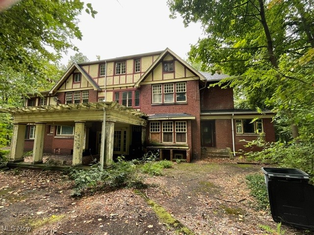 Built in 1912 by M.S. Long and designed by renowned architects Hagloch & Potter, this once-stately residence is ready for new owners to complete its renovation and restore its historic grandeur. Steeped in history, the home was later owned by Murray Parker—a cowboy, grocer, lawyer, legislator, commissioner, and restauranteur.
The first floor showcases original red oak woodwork, fireplaces in both the living and dining rooms, pocket and French doors, and a striking carved staircase. The study was converted to a bedroom with full bath, and additional gathering spaces include a bright east-facing sun porch and a cozy den. The kitchen has been fully gutted, awaiting your custom design.
Upstairs, you’ll find red gum (eucalyptus) floors, a large owner’s suite with fireplace, a secondary ensuite, another bedroom with attached sun porch, plus a family bath, cedar closet, and maid’s closet (perfect for future laundry). The third floor offers two bedrooms, a bath, a spacious bonus room, and a linen room with built-ins.
The property spans 1.65 acres in a secluded neighborhood near Wallhaven and Highland Square. Seven garages provide ample storage, including two with a roughed-in carriage apartment above. This historic home offers extraordinary potential—bring your vision and make it your own.