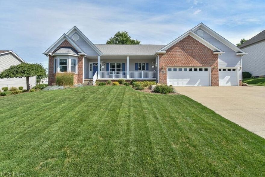 Ready to be “Wowed?” Amazing open floor plan, custom built ranch!  Be impressed the moment you walk in the door!  Gorgeous hickory hardwood flooring in the foyer, kitchen & dining area.  The great room features skylights, vaulted ceiling, and stone fireplace.  French doors lead to the dining room.  Updated kitchen offers an abundance of hickory cabinets, granite countertops, under & above cabinet lighting, backsplash, and nice appliances.  Sliders off the eating area AND master suite to your gorgeous, vaulted 3 season sunroom with access to the private backyard with brick patio and waterfall w/landscaping lights.  The master suite offers crown molding and the bath has double sinks, jetted soaking tub, walk in shower and walk in closet.  The other 2 bedrooms are good size with nice closet space – 1 bedroom has a nice bay window with window seat.  First floor lndry w/h utility sink and nice cabinets for storage.  The workshop, storage rm, and finished room will give you many options for