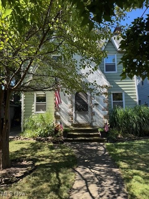 Welcome to this charming 4-bedroom, 1.5-bath Tudor home located in Euclid’s highly sought-after Edgecliff Beach Club neighborhood! Lots of character here! Great for someone wanting instant value at this price point or for an investment/renovation property. Some recent improvements include: Approximate 10-year-old roof, 5-year-old water heater, Ohio state waterproofing has been done, Furnace/Ac around 15 yrs old, kitchen is in good shape, and Hardwood floors throughout. There is an enclosed addition/sunroom off the back of the home, which could be used as a 5th bedroom or an office. Enjoy your morning coffee on the front porch or take a stroll along the lakefront for breathtaking views. There are two beach clubs located just minutes away at the end of the street on the lake, exclusively for surrounding residents. Being located just off Lakeshore Blvd with quick highway access and close proximity to parks, shopping, downtown, and dining are nearby! Don’t miss the chance to bring your vision to life in a prime Euclid location, where quiet streets and water access enhance both lifestyle and value. Secure your future with this outstanding chance to put a little of elbow grease or a renovation opportunity so this could be a great home again!