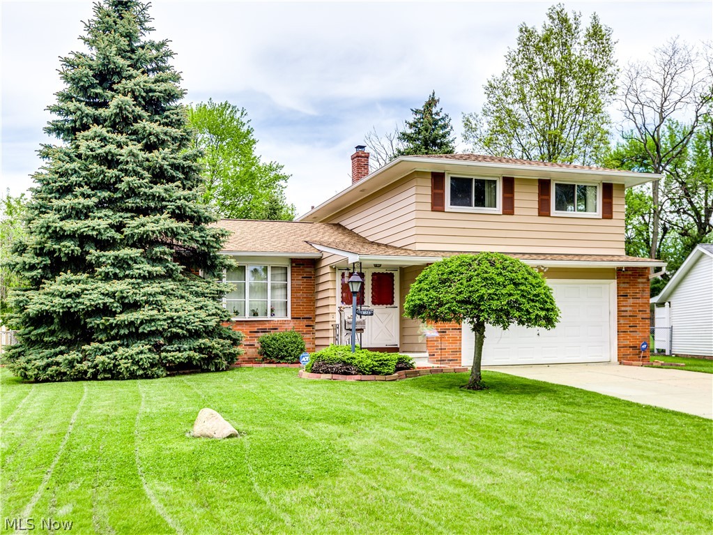 Welcome home! This three bedroom one full & one half bath home exudes the pride of homeownership and seller updates including: roof, exterior painting, vinyl replacement windows, interior flooring, HVAC & hot water tank. The stainless steel kitchen appliances, washer & dryer are also included.