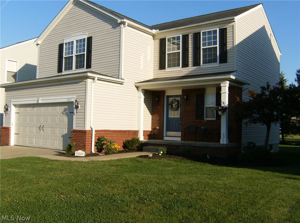 Beautiful home shows like new! Open floor plan, updated kitchen with new appliances, countertops, back splash, sink, lighting, flooring! Great room features fireplace, abundant windows overlooks peaceful back yard & new patio. First floor laundry, upstairs has four bedrooms, 2 full baths, one featured in the master suite, which also includes vaulted ceiling, walk in closet. All bedrooms are spacious with large closets. Basement is finished-ready for the kids play area or guests private space with a full bath. So much to see with this home!