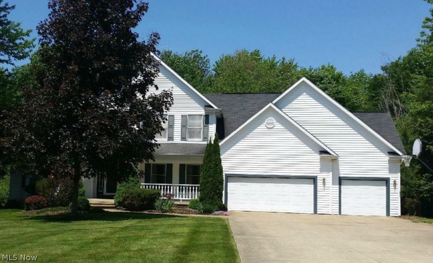 THE PRESERVE!" Spacious, 2 story, center hall Colonial on 3/4 acre level setting with scenic woods at rear of property. Convenient access to Award Winning Solon Schools and Solon Rec Center with indoor/outdoor pools and fitness!  LR/DR/Library/FamRm have Brazilian Cherry or similar hardwood floors which are newer! Huge 17x17 Kitchen with island and breakfast area, granite counters and ceramic floor. Master Bedroom has vaulted ceiling, glamour bath, large walk in closet plus bonus room ideal for office or fitness use. Spacious bedrooms. Amazing lower level with 4 rooms and full bath! Sauna and Theatre Room too! Newer furnace 2014, range 3/2015. Front porch and covered porch in rear leads to beautiful stone and paver patio. New maple kitchen cabinets being installed May 2015. New gas range in 2015; new hot water heater 2014. Wonderful home! Seller installed brand new Maple cabinetry in Kitchen just prior to contract date.