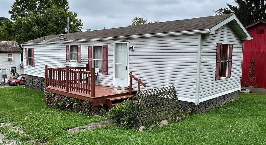 Opportunity Knocks with this 14’X48’ mobile home situated on .86+/- acres in Noble Township.  While semi private, this property is conveniently located within minutes from Caldwell & Interstate 77.  This home offers two bedrooms, one full bath as well as vinyl & carpet flooring throughout.  Home also includes all kitchen appliances as well as washer & dryer plus an outside storage shed.  Consisting of a total of 5 parcels, the possibilities are endless with this one.  You could add more homes, build a large shop or just have room to play & grow!  Home is move in ready and perfect for first time home buyers or investors looking for a turn-key money maker!   Opportunity Knocks!!!
TERMS ON REAL ESTATE: There will be a 10% Buyer's Premium added to the final bid price to determine the contract price. Successful purchaser(s), will be required to deposit a $2,500 non-refundable deposit down within 24 hours of the auction's end, with the balance due within 45 days. Property sells "As-Is/Where