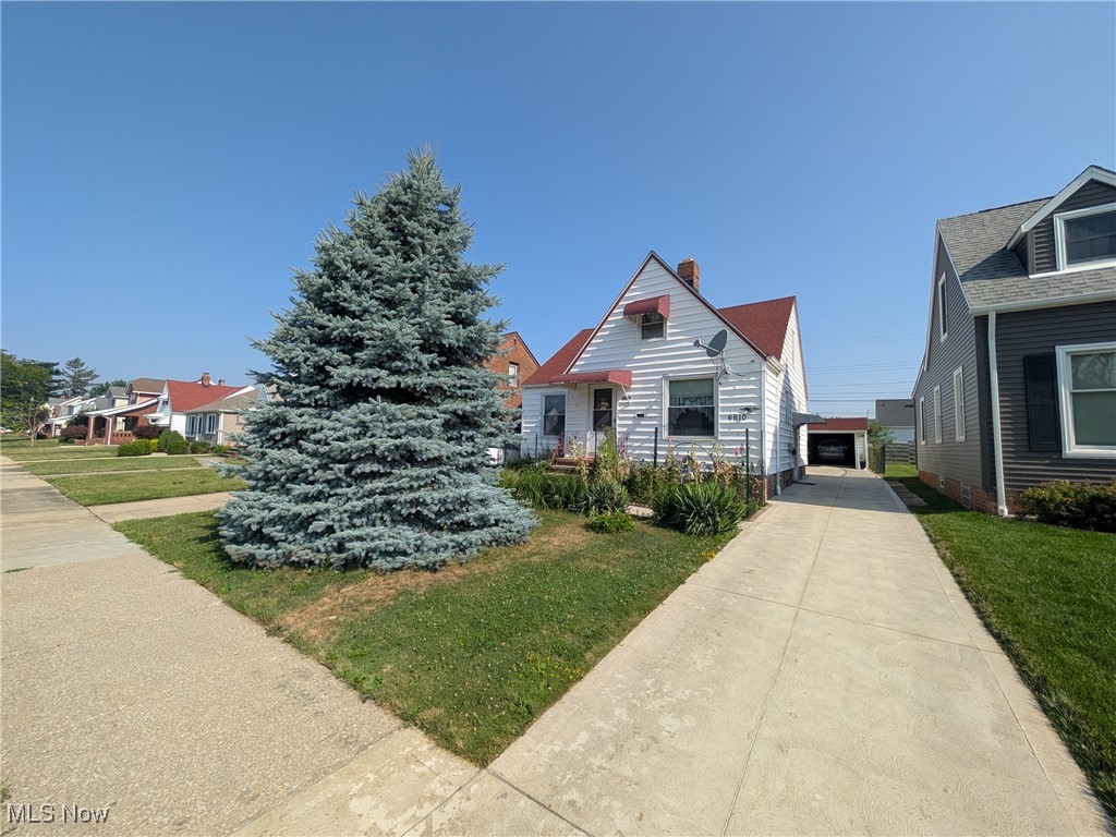 Cozy Cape Cod on a quiet street. A gorgeous garden in backyard with grape vines and vegetable plants. Improvements include: windows in 2021; roof replaced in 2019; driveway and furnace replaced in 2023.