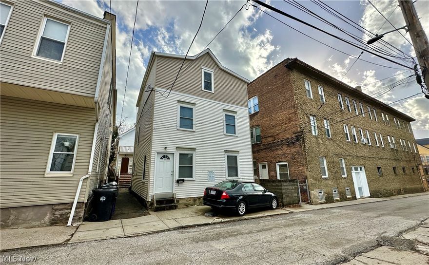 Welcome to the historic and vibrant Little Italy neighborhood. The property, situated in the heart of Little Italy and within walking distance of colleges, hospitals and museums, features two multi family homes totaling four units in the current configurations. the units have all been recently updated and are fully occupied. Three of the units contains in-suite laundry. Enjoy the great outdoor spaces that the property features. Steps away from some of the city's best restaurants, cafes, and shops. There are 5 current electrical meters, and the property is zoned for up to 6 units creating upside potential of separating a two-story unit in the front double and possibly finishing the rear house attic.  Incredible and rare opportunity!