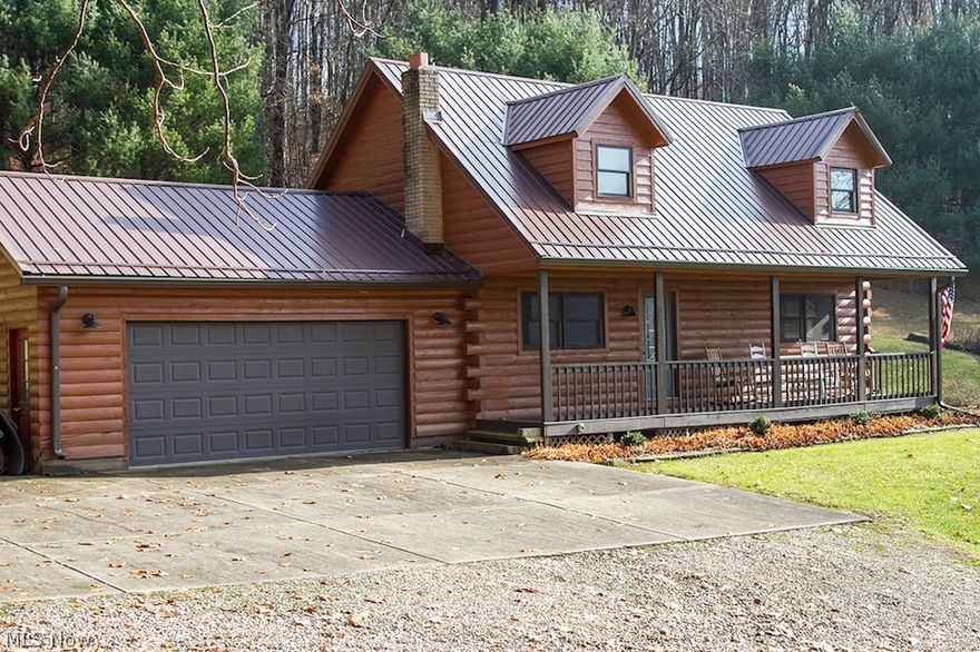 Incredible log home on 16.3 acres.  Completely remodeled and move in ready.  4 spacious bedrooms, 3 full baths, Eat-in kitchen, Jaccuzi tub, fully finished basement and pine and tile flooring throughout.  Property adjoins the Woodbury Wildlife Area, making this the perfect place for folks who love the outdoors.  Coordinates: 40.19956 / -81.91007