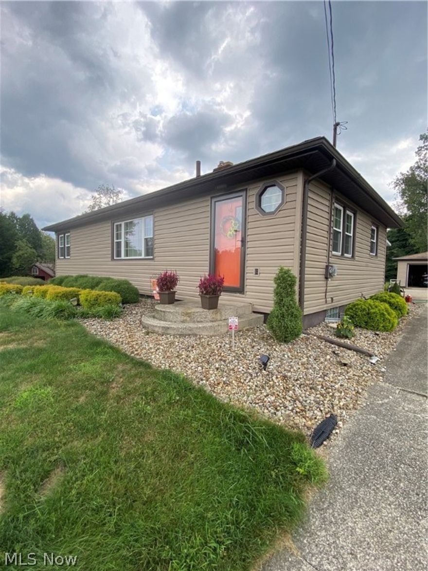 Welcome home to this beautiful updated 4 bedroom 3 full bath ranch home located in highly desirable area of Tallmadge!  This home is owned by one family throughout the years!  Be amazed by the updated eat-in kitchen with stainless steel appliances and new flooring! The cozy living room has a gas fireplace for you to enjoy your winter nights!  The large master bedroom can be accessed through it's own entrance or through the main part of the house!  The master bedroom also has a master bathroom and a laundry room!  There are 3 full baths including one in the basement!  Enjoy a cup of coffee on your enclosed patio or enjoy your nights on your paver patio with a firepit!  The large backyard is an added bonus! New siding, newer furnace, updated windows throughout the entire home!  Don't miss this one!