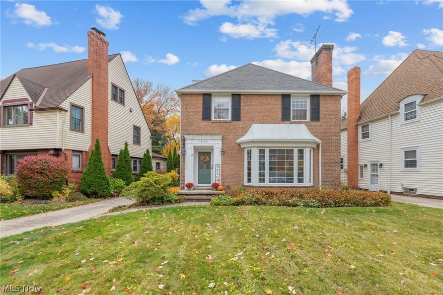 Experience modern elegance and timeless charm in this beautifully updated Fairview Park home. Thoughtful design and refined details flow throughout, beginning with the inviting living room featuring a large bay window that floods the space with natural light, a cozy fireplace framed by built-in shelves, and warm, welcoming character. The spacious dining room offers the perfect setting for gatherings, while the adjacent sunroom provides a serene retreat—ideal for a reading nook, music room, or morning coffee spot. The kitchen shines with contemporary sophistication, boasting custom cabinetry, sleek countertops, a striking tile backsplash, updated lighting and electrical, and a new ceiling—all completed between 2024 and 2025. New flooring enhances the kitchen, landing, and first-floor bath, blending comfort with style. A convenient half bath completes the main level. Upstairs, you’ll find three well-appointed bedrooms and a full bath designed for comfort and function. The lower level offers a large flexible space—perfect for an exercise area, kids’ playroom, or casual entertaining—plus a laundry area and additional storage. Outside, a detached two-car garage, expansive driveway, and generous grassy area provide plenty of room for entertaining or play. Ideally situated near restaurants in West Park, Fairview, and Lakewood, as well as shopping at Westgate Mall, this home also offers effortless access to the Metroparks and Fairview Recreation Center—perfect for those seeking a modern, connected lifestyle.