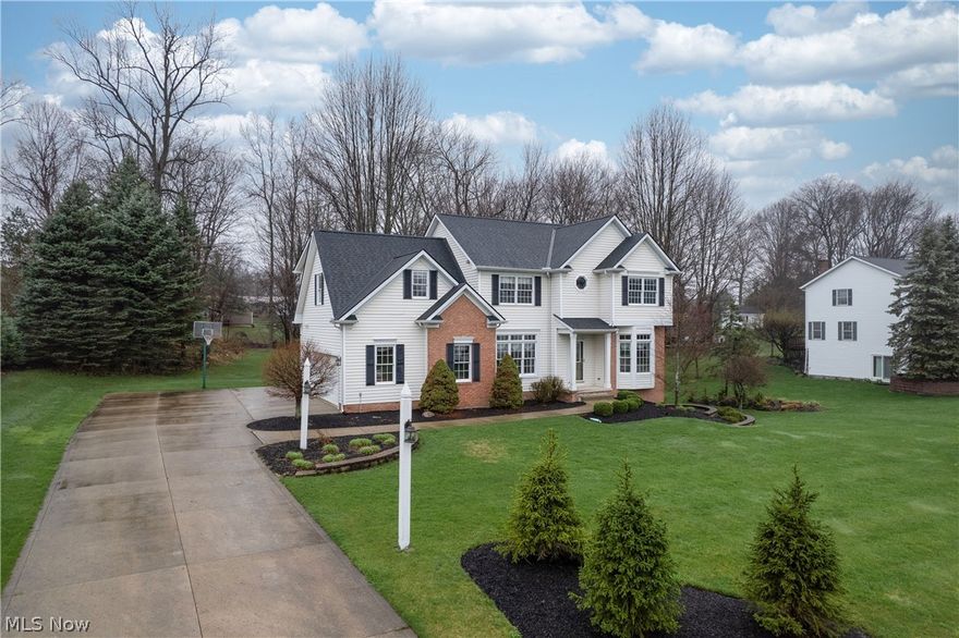 Welcome to this beautifully maintained home in one of Perry's premier subdivisions, Canyon Ridge! This home has been meticulously designed for family life and beautifully updated. The first floor features a sitting room, a formal dining room, a kitchen with an eat-in breakfast area, and a large great room! The open floor plan is perfect for entertaining, with the open space flowing out onto the elevated back deck.

The second floor features a huge master suite with a bedroom, a sitting area, a bathroom, and access to the upstairs laundry. Three more generously sized bedrooms and a full bath round out the second floor. The basement has been partially finished and includes a rec room and a game area; the best part of the basement, however, is that it is a WALK-OUT! Want to add more finished space, maybe a teen suite or an in-law suite downstairs? Go for it!

There are so many new items in the house: the roof (2024), HVAC and water heater (2023), carpet (2026), plus a kitchen and master bath remodel! This home is just waiting for a new owner. Come experience why Perry Schools are award-winning and ranked top of the class! Also, enjoy some of the lowest taxes in Lake County within Perry Township! Make this home your NEW HOME!