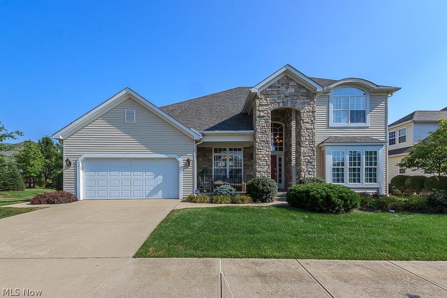 Stunning front porch Colonial with open floor plan and attention to detail throughout. This custom built home features arched openings, niches and crown molding giving it character and distinction. First floor Master with sitting area, large walk in closet and modern bath. Beautiful hardwood floors on first floor. Chef's kitchen with updated cabinets with roll out drawers, granite counters, pantry, built in appliances, Island, breakfast bar, dining area and hearth room with fireplace. Formal living room with 2 story ceiling. Formal dining room with tiered ceiling. First floor Den/office. First floor laundry with storage.  2 bedrooms up with an additional bonus/flex room that can easily be converted into a 3 Rd bedroom up. Lower level with finished Recreation room with bath ideal for entertaining. Large storage area/workshop. Lovely patio area ideal for morning coffee. Professionally landscaped yard with sprinkler system. Enjoy Aberdeen amenities including a pool, tennis courts, trails,