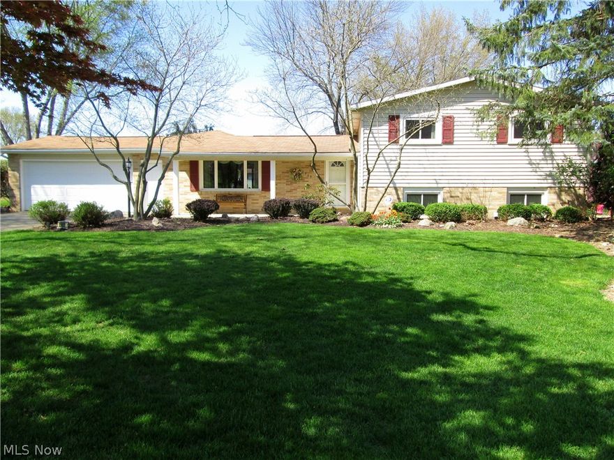 Beautiful impeccably kept lake view home. View the lake from the over-sized sunroom, living room, kitchen, family room, or master bedroom. Two fireplaces to make the home cozy in the winter. Maintenance free brick and vinyl sided exterior. Newer kitchen and appliances. Home has a living room plus a family room in the walk-out lower level.